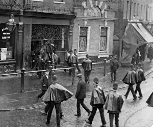 Arrests Prints: Mounted police and officers on the ground try to secure a refractory prisoner at a pub