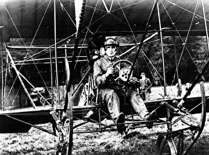 00375 Prints: Mr Arthur George, of Newcastle, in one of the early flights in his homemade biplane