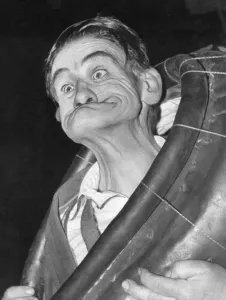 Mr Bennison demonstrates the winning twist - gurning June 1975