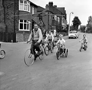 Riders Collection: Mr Clifford Davis of Leeds Road Wakefield, tries out his flying machine made from bits of