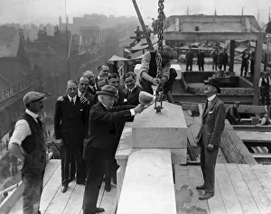 Commerce Prints: Mr Gordon Selfridge lays the last stone which completes the Oxford Street facade of his