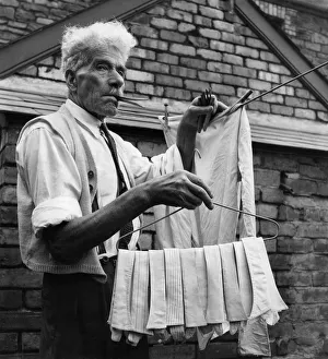 Laundry Prints: Mr. Ilerbert Tilling, aged 81, lives along in his terraced valley home in Pontypridd