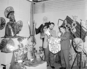 Mr Jack Fielding (left) and Mr E Ogle examine a gold-trimmed Roman officer