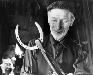 Blacksmith Prints: Mr. Jackie Pearson the Kirkwhelpington village Blacksmith who is regarded as