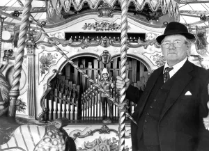 Mr. James Crowe with the renovated Verbeck organ at Whitley Bay fairground in August 1976