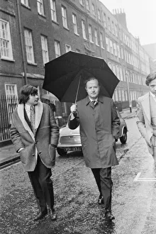 Mr James Douglas Spooner, pictured holding his umbrella