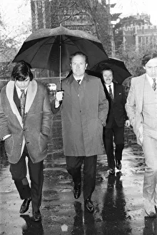 Mr James Douglas Spooner, pictured holding his umbrella