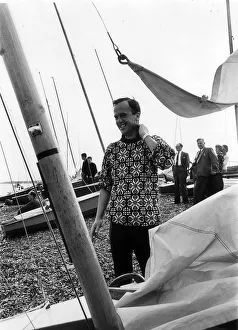 Mr John Cobbold chairman of Ipswich FC on the beach at Felixstowe. September 1964