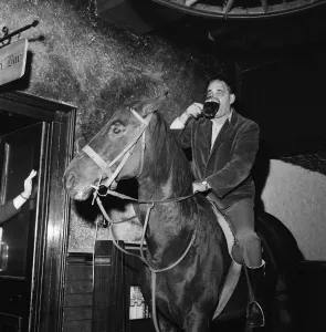 Lancashire Prints: Mr Leslie Johnson rides his horse Lady'into the bar of the Fox and Goose
