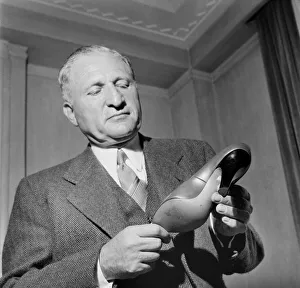 00008 Prints: Mr. Maurice Miller with the Stiletto shoe. Note the tiny heels