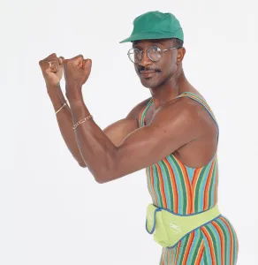 Exercises Prints: Mr Motivator Derek Evans performing doing exercises. 3rd September 1993