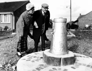 Jubilee Prints: Mr and Mrs Caswell look at the Silver Jubilee Churn that was erected near Gillingham in