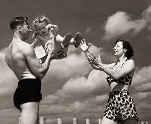 Catching Prints: Mr and Mrs G T lock with their daughter Judith Anne on holiday at Sandwich Bay