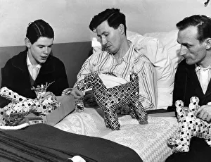 Mr. Scucnell a patient in Harts Hospital, Woodford. shows fellow patients how to make