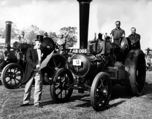 Vintage Prints: Mr Bill Weeks, complete with top hat, gets ready with a red flag to start the steam