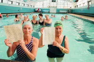 Swimming Pool Prints: Mrs Ada Foley, left, and Mrs Winnie Hutchinson with the petition drawn up to keep their