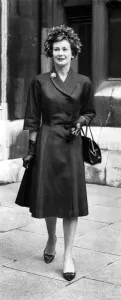 Mrs. D. Davis ( Dinah Sheridan) who got her divorce from her husband who heads of