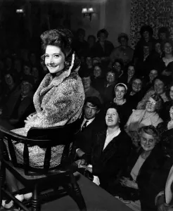 Manniquin Prints: Mrs. Freda Pelker won this lucky-prize coat in Persian lamb