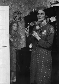 Mrs. Grace Lewis poses for this double exposure to illustrate the strange illusion that