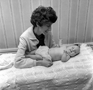 00044 Prints: Mrs. Heulwen Jones with her baby daughter 14 weeks old Enfys-haf who was born at St