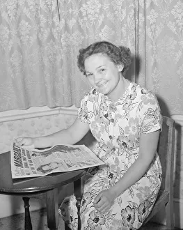 Floral Dress Prints: Mrs Higgins seen here reading about Princess Margaret and Peter Townsend in the Daily