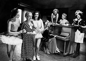 Piano Prints: Mrs Laura Henderson owner of the Windmill Theatre seen here taking coffee with some of
