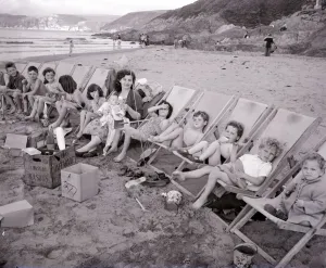 Mrs Mavis Graham and her 12 children seen here having a picnic beside the sea at Bigbury