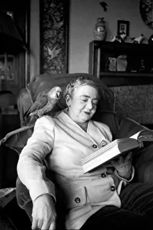 00021 Prints: Mrs. Millicent Bruce lecturing on Shakespeare seen here with her pet parrot Henry