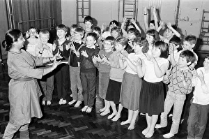 00586 Prints: Mrs Piala Ray takes the children through an Indian dance class during the Kirklees
