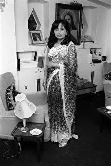 Mrs Pushram Savundra wife of Dr Emil Savundra wearing a sari at her home in