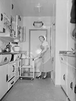 Inventions Prints: Mrs Susan Davies seen here loading up here hostress trolly before serving afternoon tea