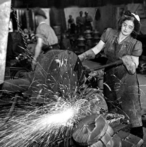 Heavy Prints: Mrs Violet Nixon works in a Yorkshire Foundry metal industry September 1947