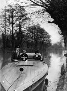 Mrs. W C Thiele (right) and Mrs. P Bartlett who are the helmsmen of patrol launches of