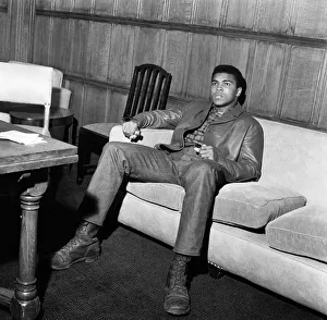 Portrait Posed Prints: Muhammad Ali aka (Cassius Clay) relaxing in his suite at the Piccadilly Hotel London