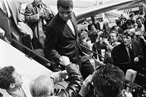 01027 Prints: Muhammad Ali arrives in England ahead of his rematch with Henry Cooper on 21st May