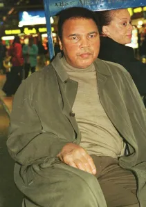 Portrait Posed Prints: Muhammad Ali boxing legend December 1999 leaves Heathrow Airport for the United