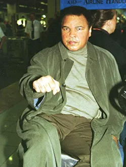 Muhammad Ali boxing legend December 1999 leaves Heathrow Airport for the United