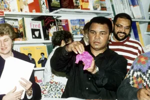 00442 Prints: Muhammad Ali (Cassius Clay) former boxing champion does tricks to entertain the crowd