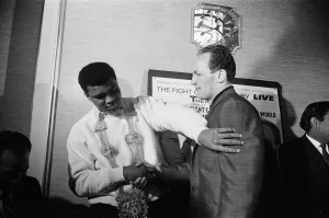 Muhammad Ali (Cassius Clay) and Henry Cooper at a press conference ahead of their