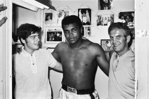 Micky Duff Prints: Muhammad Ali (centre) with boxing promoter Micky Duff (left) at a New York gymnasium