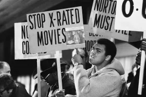 Gestures Prints: Muhammad Ali and his entourage holding anti Ken Norton banners ahead of their third fight