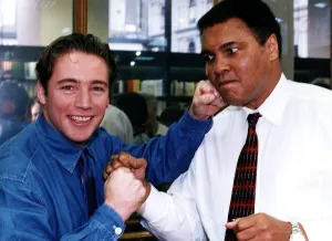 Footballer Prints: Muhammad Ali ex world champion boxer with Ally McCoist from Rangers Football Club