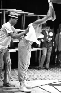 Muhammad Ali getting wiped down with a towel from trainer Walter Blood