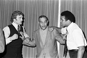 Muhammad Ali and Joe Bugner at a press conference for their upcoming fight