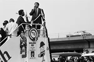 00764 Prints: Muhammad Ali mobbed by 1, 000 fans as he opened the Hockley Sporting Centre named after