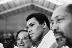 Muhammad Ali at a pre fight press conference for his upcoming fight with Larry Holmes
