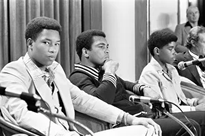 Muhammad Ali at a press conference with Phillip Chip'McAllister, left