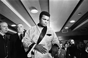 Portrait Posed Prints: Muhammad Ali at a press conference prior to his fight with Alvin Lewis, aka Blue Lewis