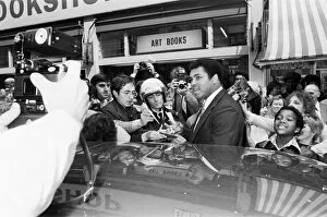 00777 Collection: Muhammad Ali signing autographs outside the Odeon in Birmingham. 7th June 1979