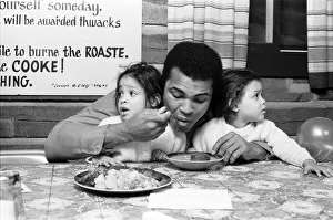 Kitchen Prints: Muhammad Ali with twin daughters Jamillah and Rasheda in Deer Lake Pennsylvania